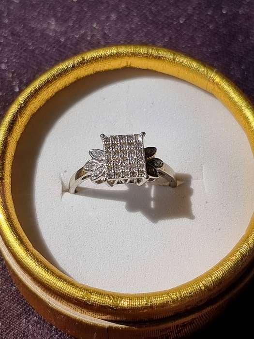 "0.15 CARAT" DIAMOND CLUSTER RING" Set in 9 Carat White Gold. ( Genuine Gold.)