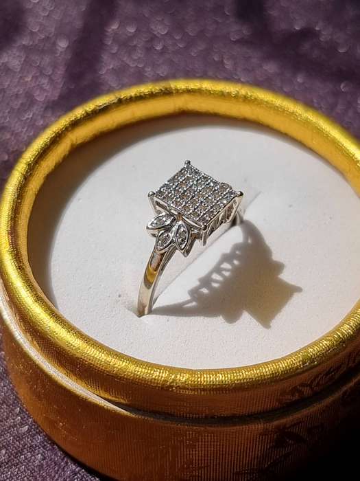 "0.15 CARAT" DIAMOND CLUSTER RING" Set in 9 Carat White Gold. ( Genuine Gold.)