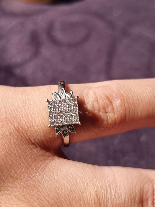 "0.15 CARAT" DIAMOND CLUSTER RING" Set in 9 Carat White Gold. ( Genuine Gold.)