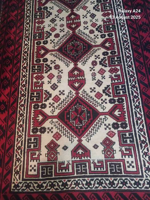 A Persian hand knotted Beluchi runner