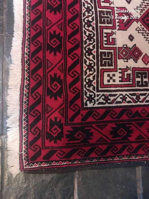 A Persian hand knotted Beluchi runner