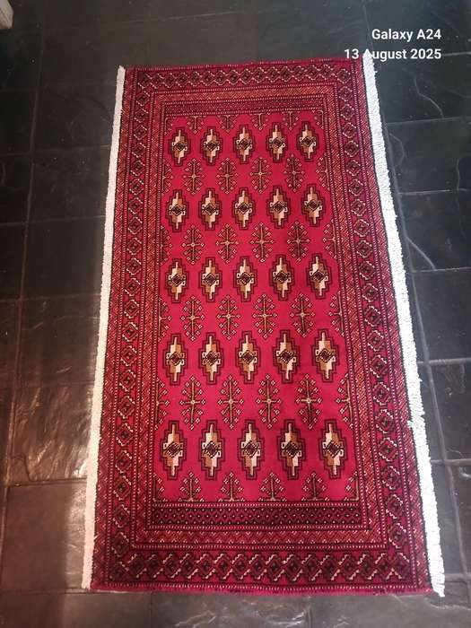 A Persian hand knotted Turkaman carpet
