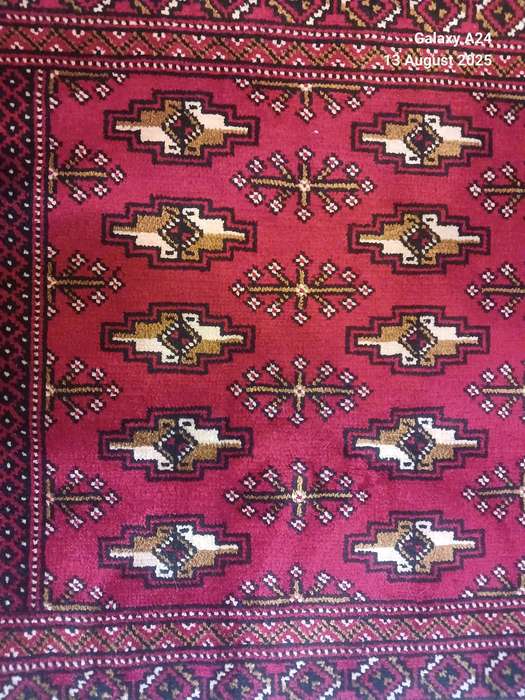 A Persian hand knotted Turkaman carpet