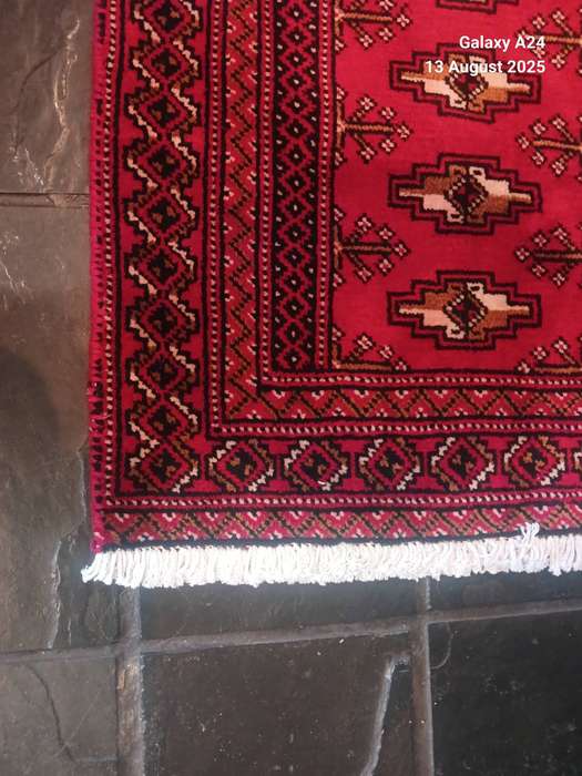 A Persian hand knotted Turkaman carpet