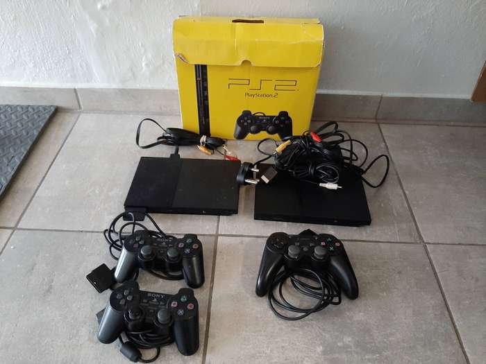 2x Original Sony Playstation 2 Slim's + 3 Controllers + 8 Games & more - Great Working Condition