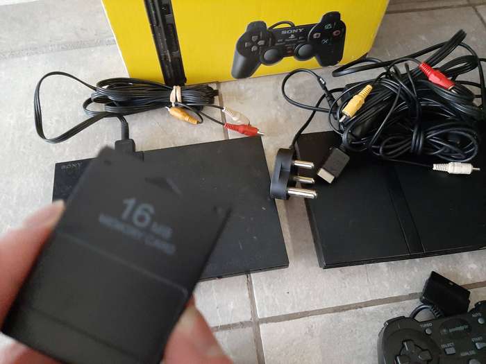 2x Original Sony Playstation 2 Slim's + 3 Controllers + 8 Games & more - Great Working Condition
