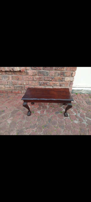 Solid Imbuia coffee table, ball and claw legs