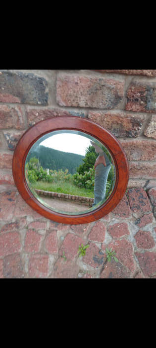 Antique round imbuia circular antique mirror