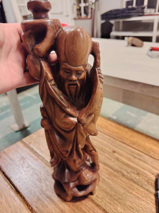 Stunning hand carved oriental figure