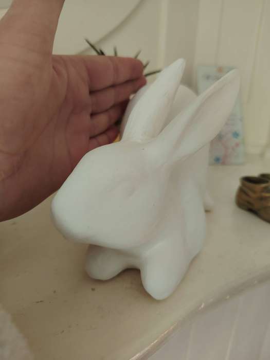 Beautiful clay crouching bunny ornament