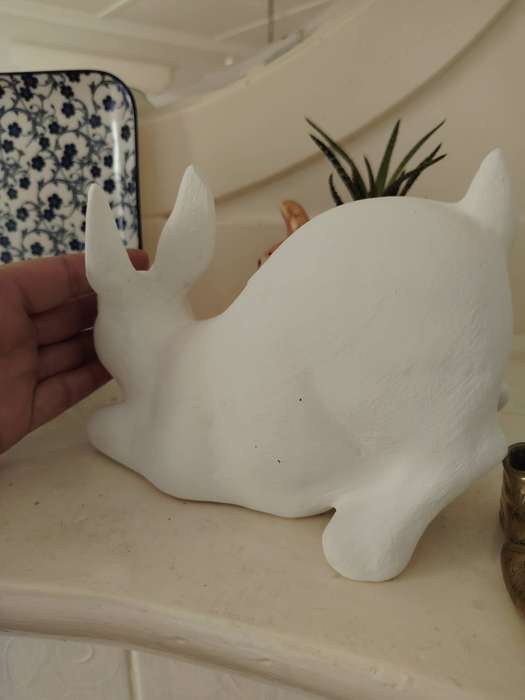 Beautiful clay crouching bunny ornament
