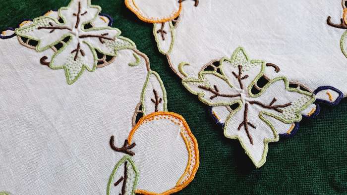 2 small embroidered mats 13cm x 13cm