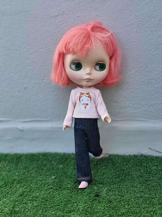 The Prima Dolly Peony Blythe doll is a cherished collectible, released in June 2008 as a CWC Limited