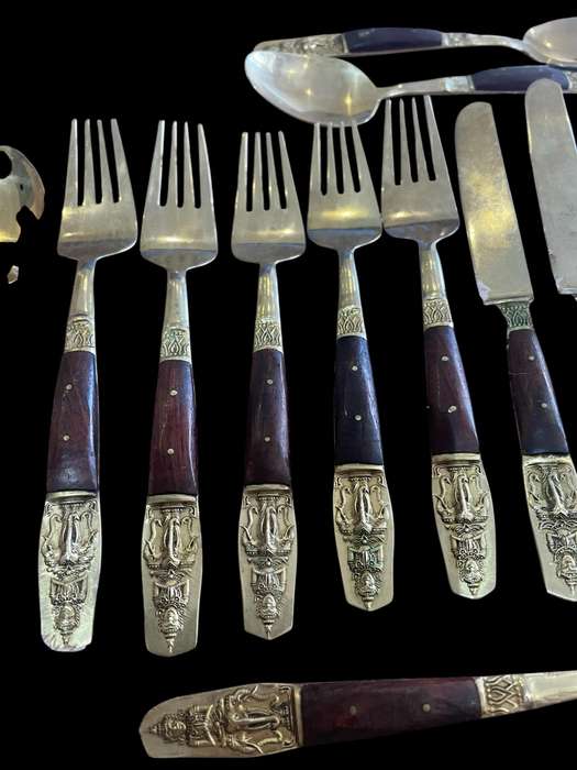 Cutlery set brass