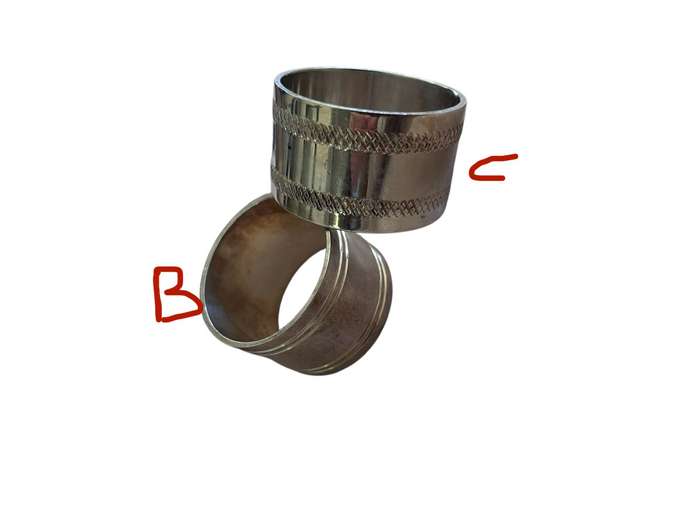 Napkin rings silver plated each(C,D)