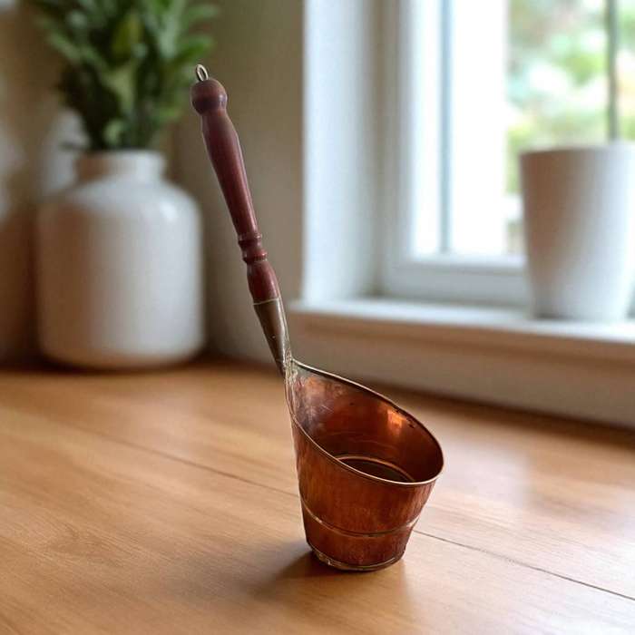 Copper scoop antique