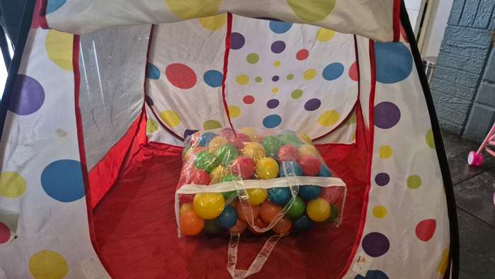 Pop-up Tent and plastic balls.