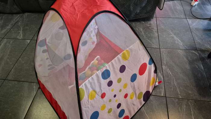 Pop-up Tent and plastic balls.
