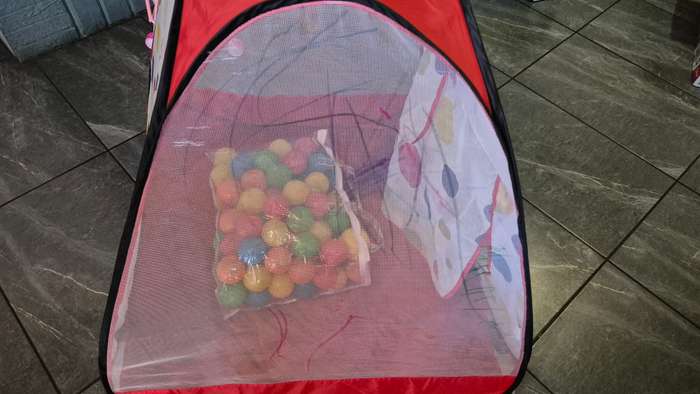 Pop-up Tent and plastic balls.