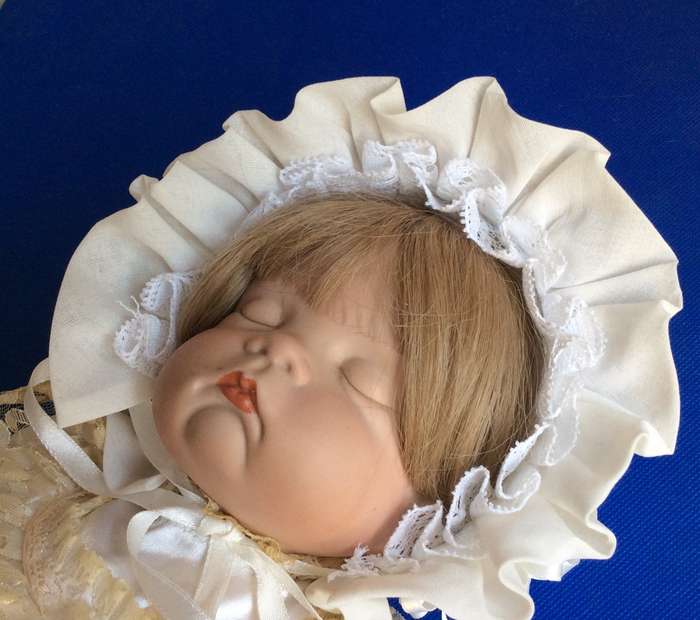 Sleeping Baby Porcelain Doll in Victorian style Dress and Bonnet