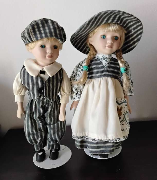Pair of Vintage Porcelain Dolls on Stands
