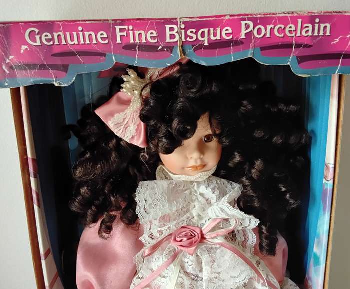 Collectors Choice Limited Edition Bisque Porcelain Doll with stand and COA