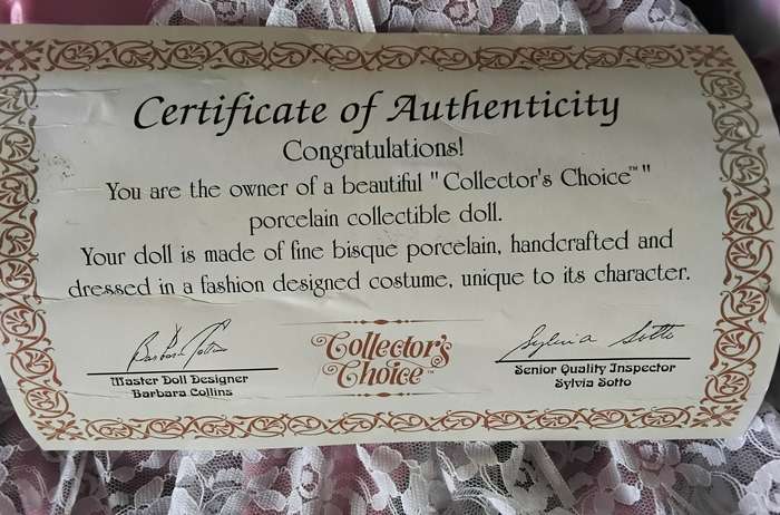 Collectors Choice Limited Edition Bisque Porcelain Doll with stand and COA