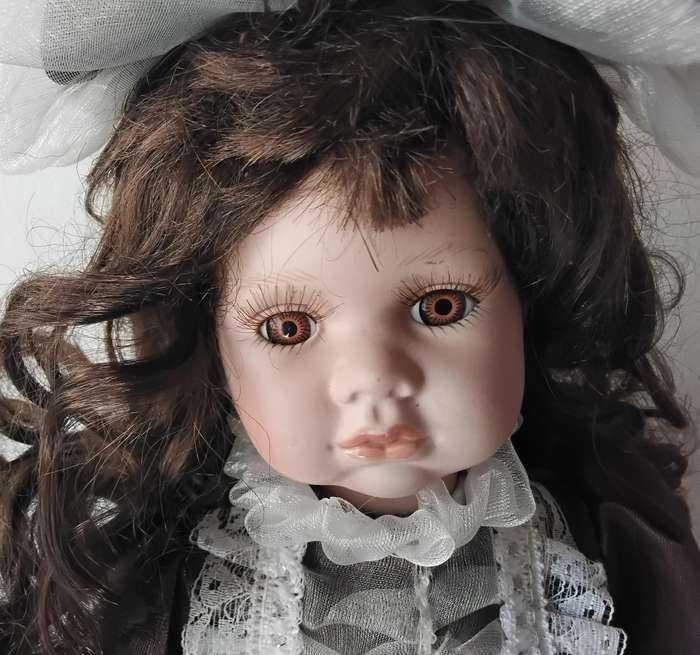 Vintage Porcelain Doll on Stand