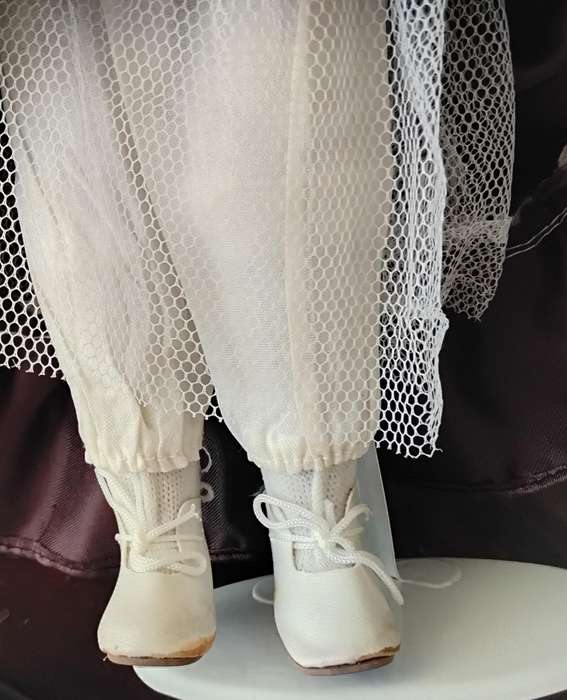 Vintage Porcelain Doll on Stand