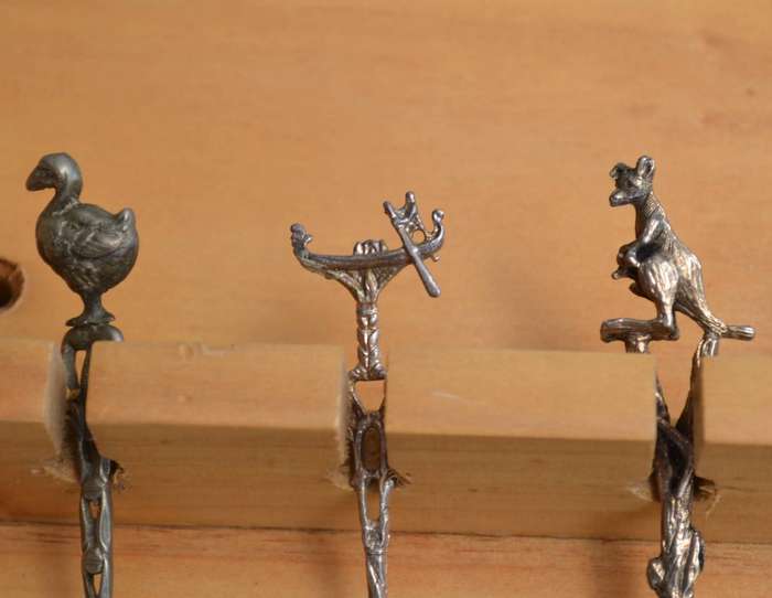Collectable vintage Charm Style Handle Spoons in wooden Display Rack - 24 Spoons