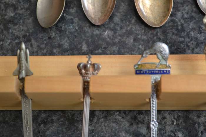 Collectable vintage Charm Style Handle Spoons in wooden Display Rack - 24 Spoons