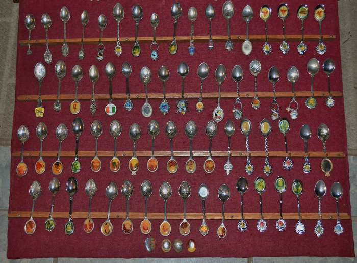 Large Collection of  Vintage Souvenir / Collectable Spoons in Display Case