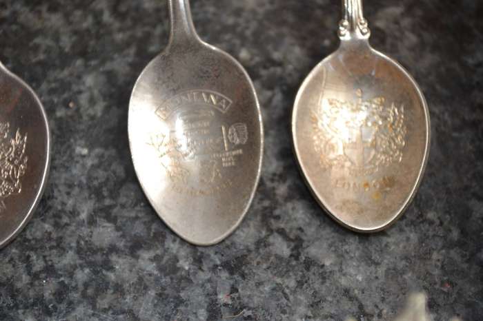 Collectable vintage Charm Style Handle Spoons in wooden Display Rack - 24 Spoons