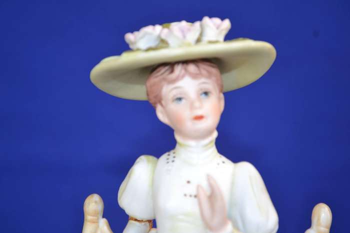 Vintage Bisque Porcelain Figurine Seated in Chair