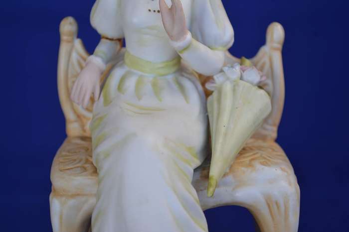 Vintage Bisque Porcelain Figurine Seated in Chair