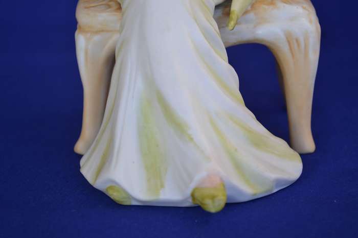 Vintage Bisque Porcelain Figurine Seated in Chair