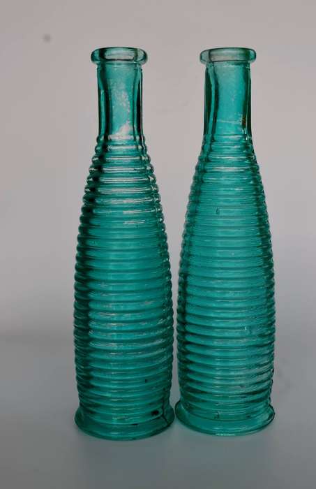 Pair of Ribbed Turquoise Collectable Bottles