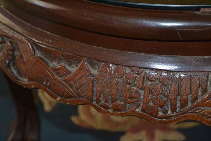 Chinese Oval Vintage Coffee Table with Carved Battle Scene under fixed glass top