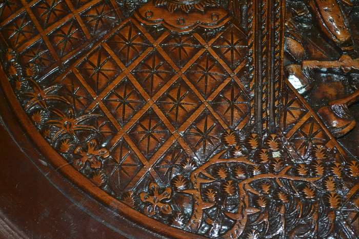 Chinese Oval Vintage Coffee Table with Carved Battle Scene under fixed glass top