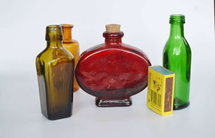 Selection of Four assorted collectable bottles