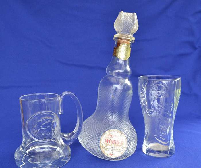 Magazzin Wobble Bottle Decanter Bottle and 2 branded Glass Glasses