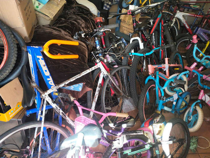 50 BICYCLES , NEW AND USED SPARES TAKE THE LOT