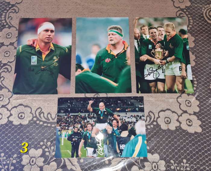 Signed photos from former Springbok 1995 World Cup winners: Stansky, Wiese, Os, and Andr.