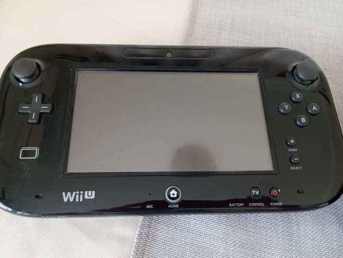 Nintendo Wii U console with game