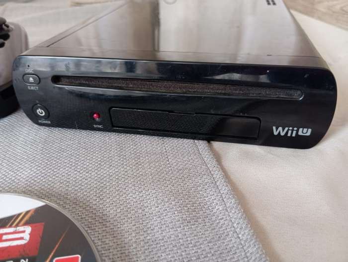 Nintendo Wii U console with game