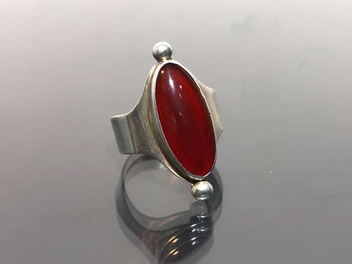 A Silver Ring set with a Red Carnelian Stone