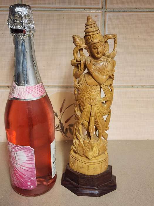 VINTAGE ELABORATELY CARVED WOODEN STATUE, DEPICTING LORD KRISHNA PLAYING THE FLUTE
