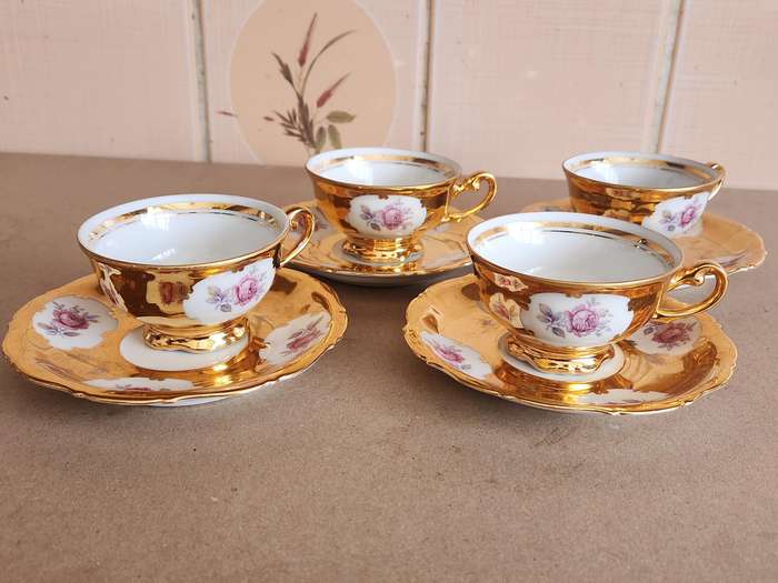 SET OF FOUR STUNNING GERMAN PORCELAIN DEMITASSE CUPS AND SAUCERS