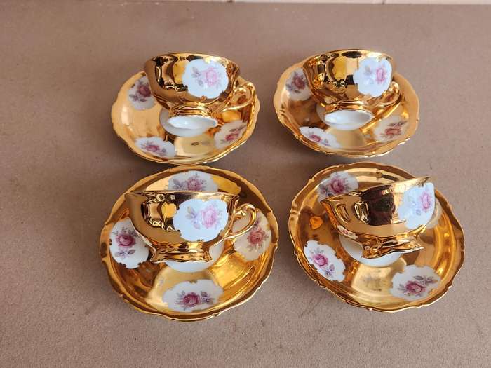 SET OF FOUR STUNNING GERMAN PORCELAIN DEMITASSE CUPS AND SAUCERS