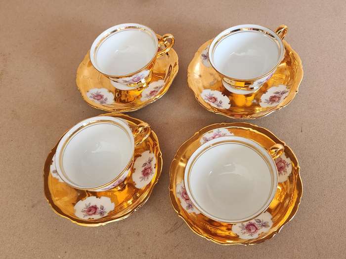 SET OF FOUR STUNNING GERMAN PORCELAIN DEMITASSE CUPS AND SAUCERS